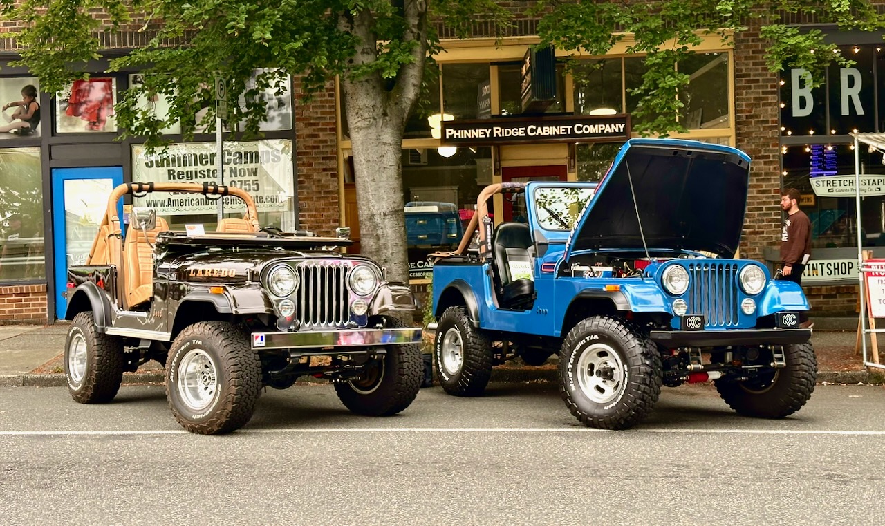 Black CJ-7 Laredo and blue CJ-7 Renegade side by side